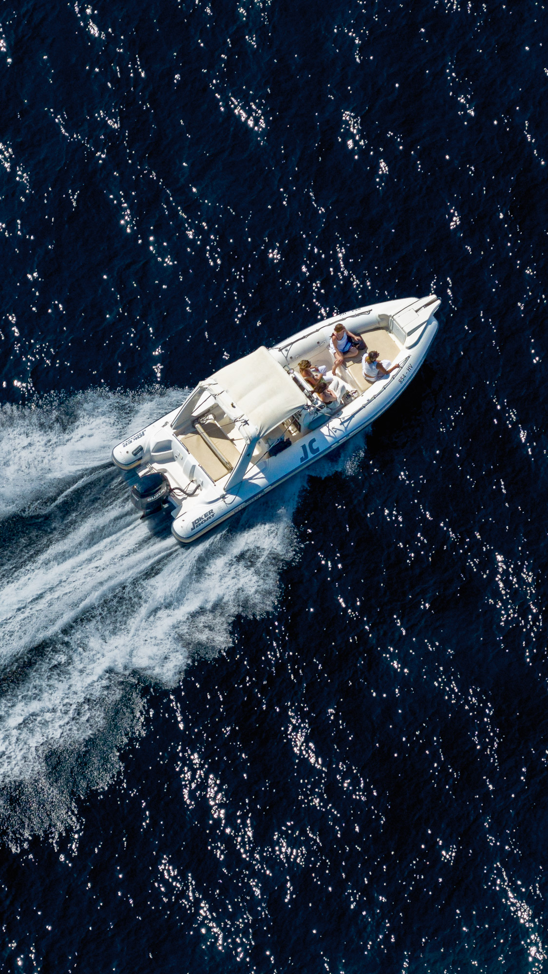 Speedboat cruising in open sea off the south coast of Hvar
