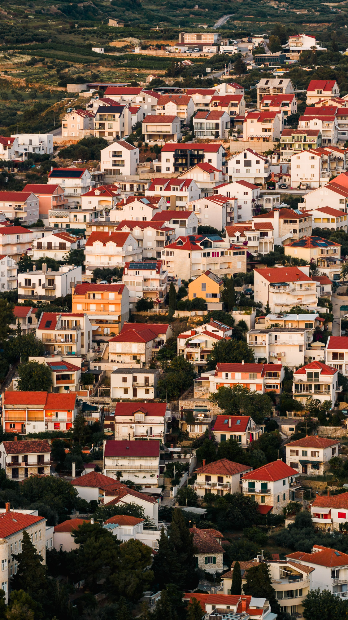 Hvar old town aerial rooftops drone view